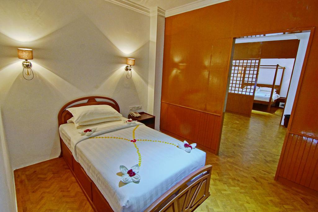 Wilson Hotel Mandalay Habitación foto